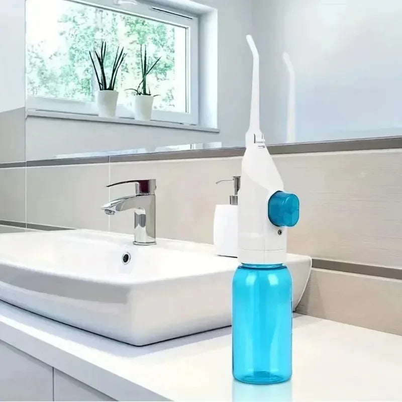 Keep your smile fresh and clean with this portable manual water flosser, designed for effective everyday oral care. Featuring a sleek, compact design with an easy-to-fill water reservoir, it delivers a focused, high-pressure