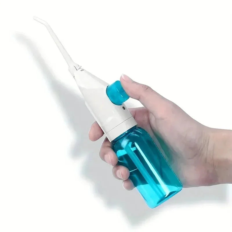 Keep your smile fresh and clean with this portable manual water flosser, designed for effective everyday oral care. Featuring a sleek, compact design with an easy-to-fill water reservoir, it delivers a focused, high-pressure